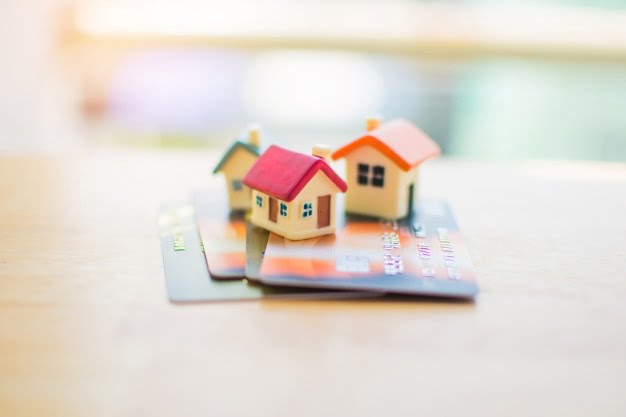 miniature-house-credit-card-subject-is-blurred_33811-286